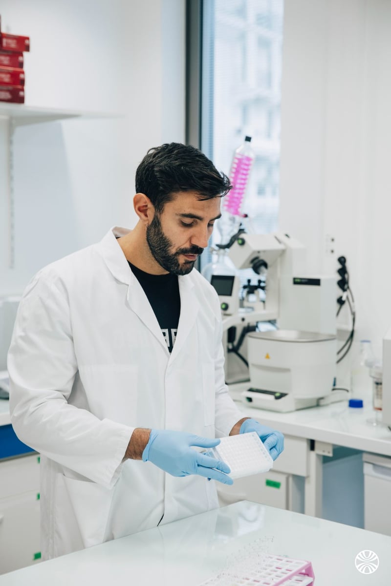 Guido preparing laboratory materials at the bench